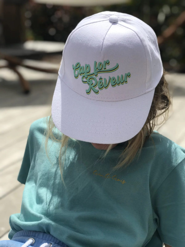 Une casquette Cap for rêveur blanche de la marque régionale 33.