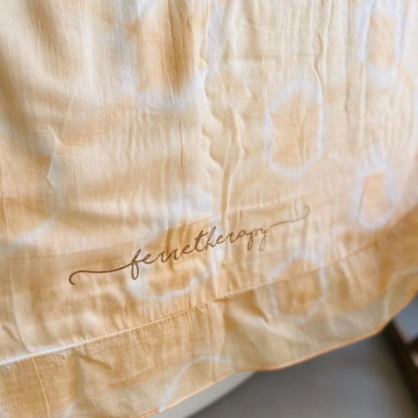 Une fouta peche estampillée "Ferretherapy" de la marque régionale 33.