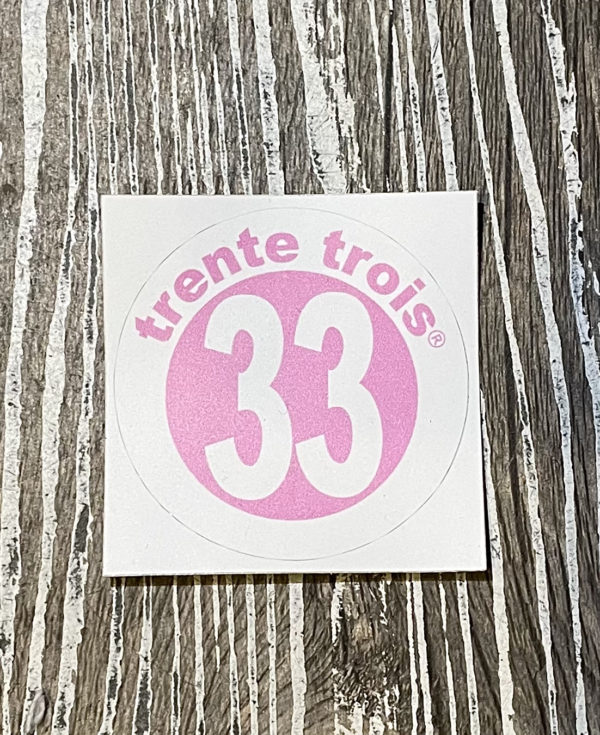 Un autocollant 33 rose petit de la marque régionale 33.